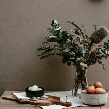 Fresh eggs on a table with a vase at Wren's Hollow, new townhomes in Pooler, GA